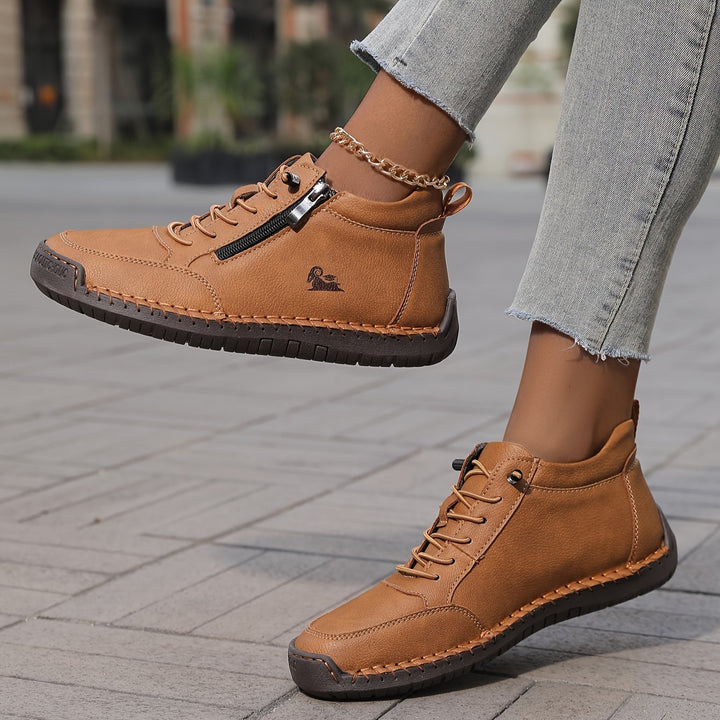 Supportive women's high-top sneakers with zip & laces, offering non-slip grip and comfort.