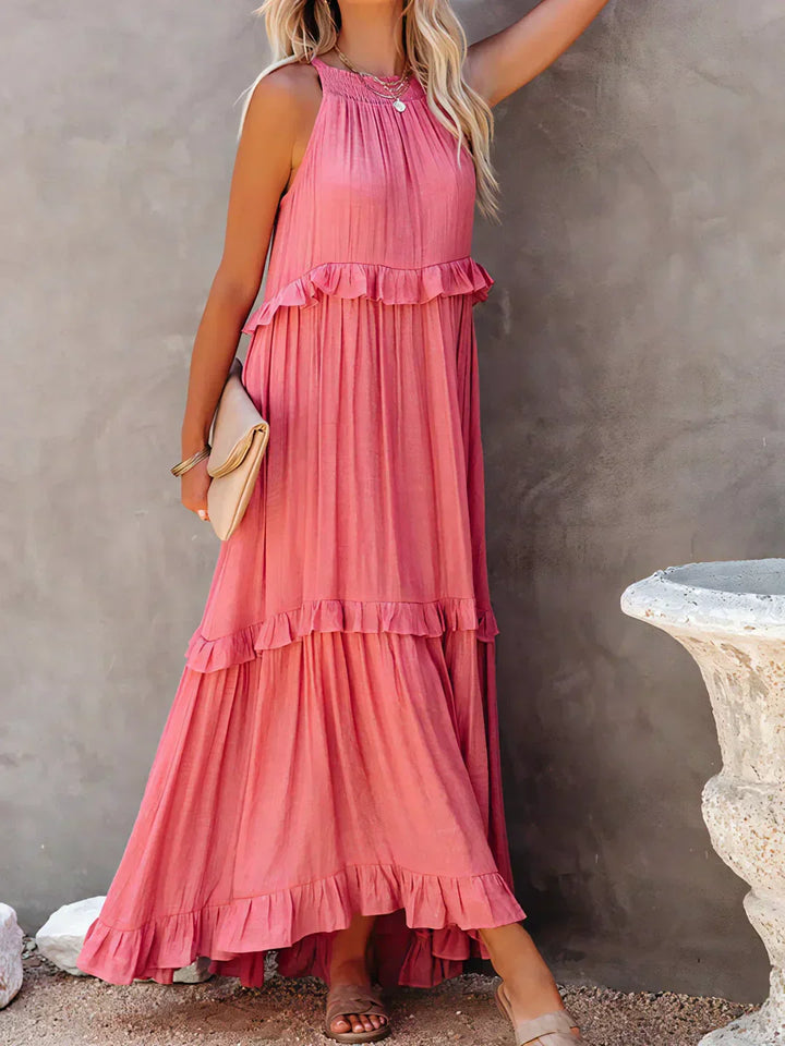 Women's elegant halterneck ruffle maxi dress, with pockets, for a chic holiday.