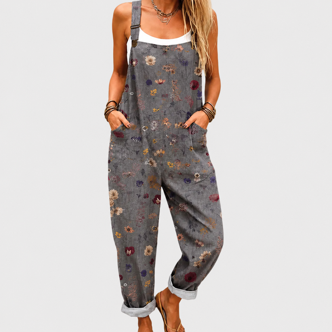 Woman wearing a comfortable printed wide-leg jumpsuit, ideal for casual spring and summer fashion.