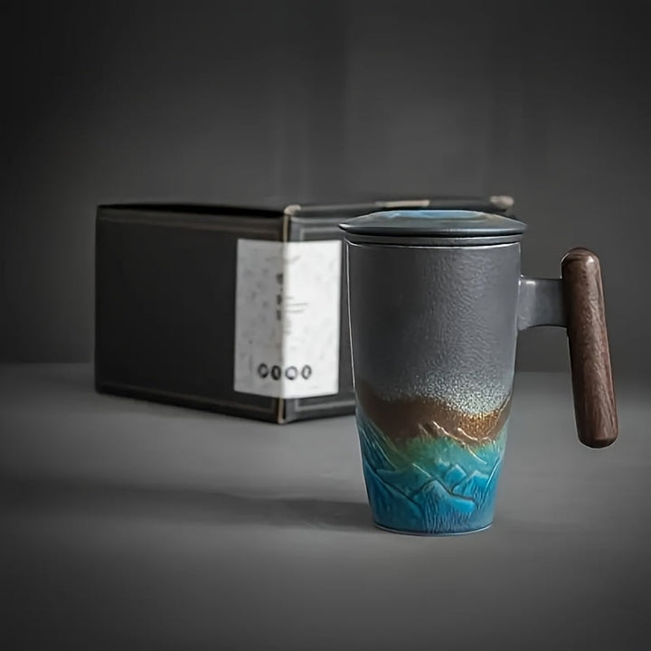 Premium handmade tea mug with a clever strainer for brewing loose leaf tea; artistic ceramic.