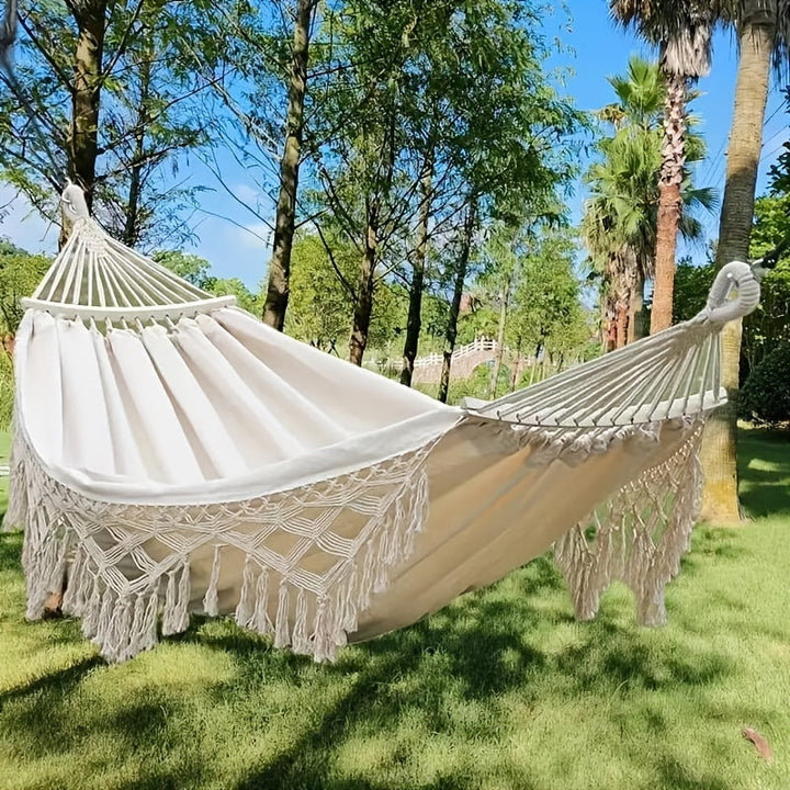 Unisex double hammock with colorful bohemian stripes & stylish fringe tassels.