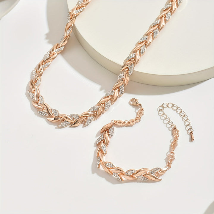 Full set display of the women's elegant fish tail jewelry, featuring a rhinestone necklace & bracelet in rose gold.