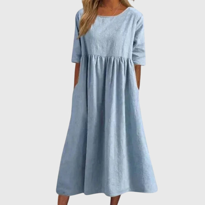 Classic women's short sleeve midi dress, flattering and elegant for any occasion, from casual to chic.