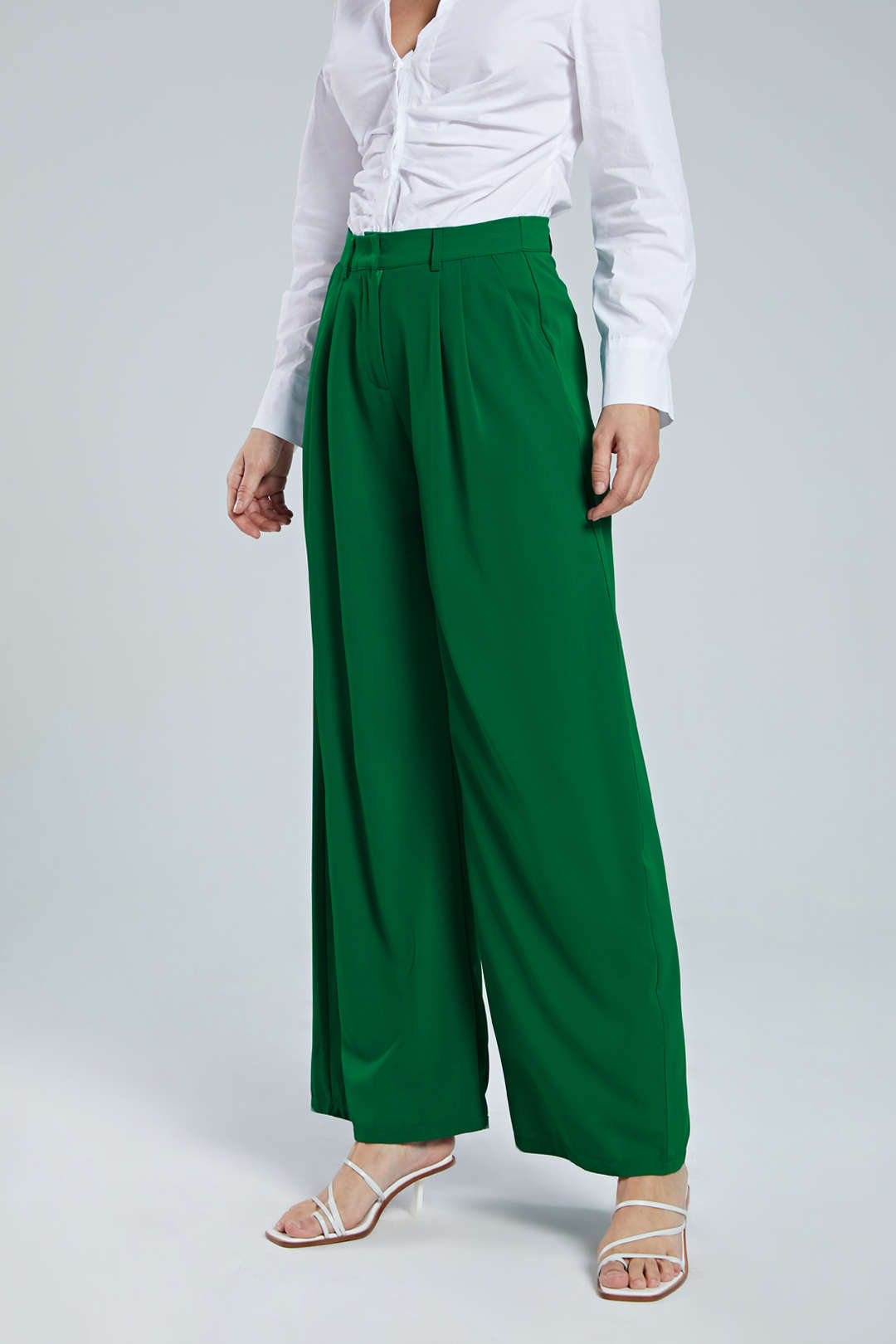 Fashionable high waist wide leg trousers with pleats, offering comfort and a chic silhouette.