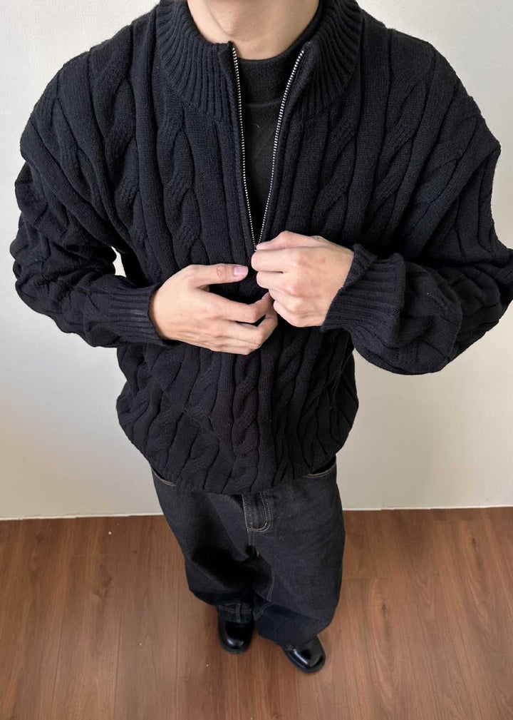 Classic men's quarter-zip cable knit sweater. Versatile mock neck pullover for winter.