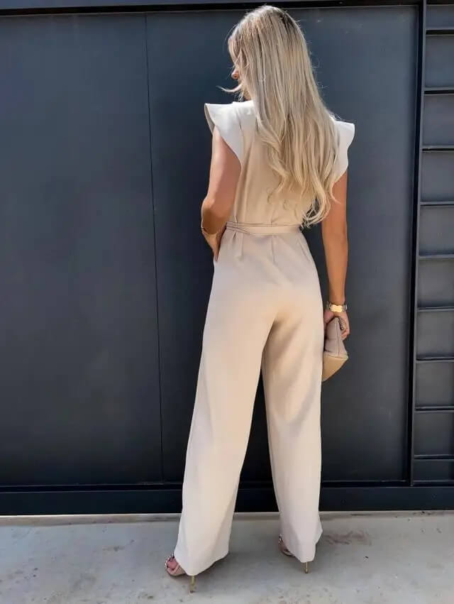 Chic women's belted jumpsuit with wide legs & butterfly sleeves, perfect for day to night elegance.