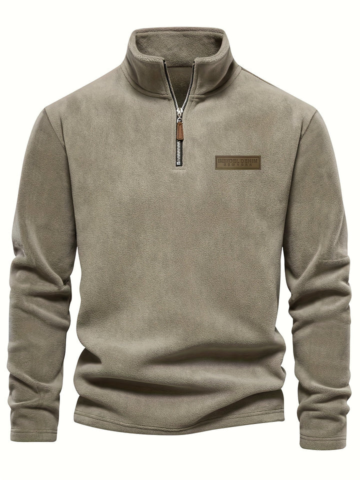 Casual unisex long-sleeve half-zip pullover, ideal layering piece for fall and winter chilly weather.