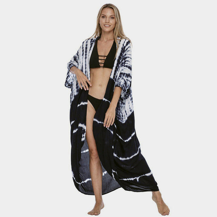 Glamorous women's beach cover up, stylish sun protection, perfect for a chic summer dress.