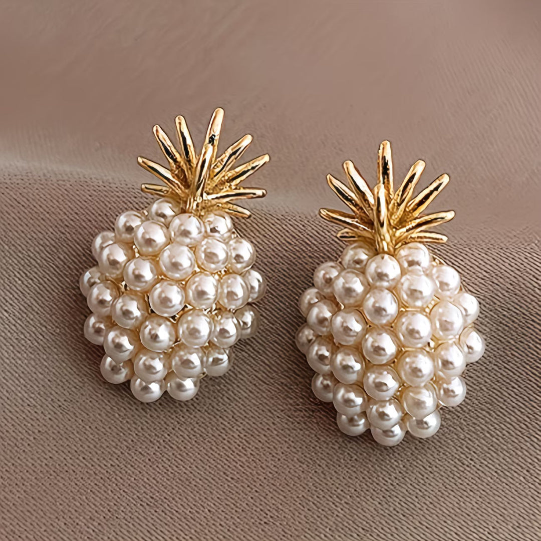 Elegant women's pearl pineapple drop earrings, unique fashion jewelry for a statement look or gift for her.