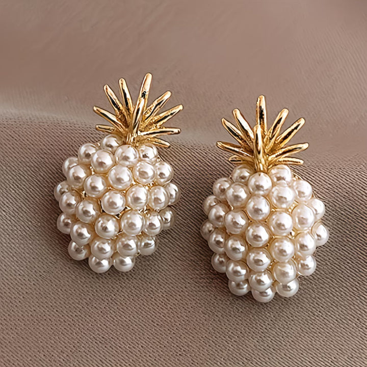 Elegant women's pearl pineapple drop earrings, unique fashion jewelry for a statement look or gift for her.