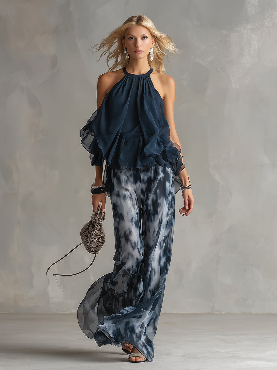Effortless navy blue women's casual chic two-piece outfit featuring a modern turtleneck top and wide-leg trousers.