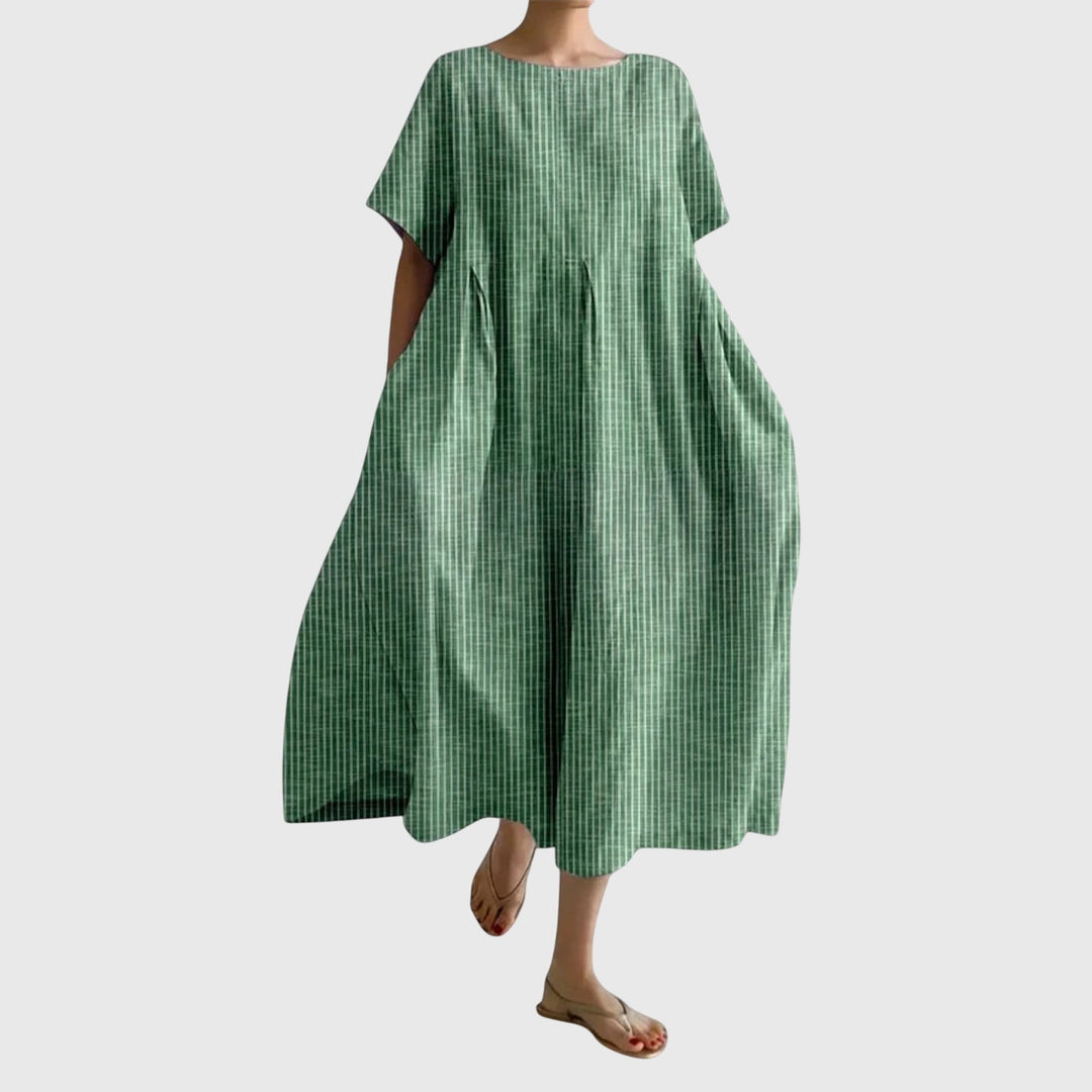 Comfortable women's long striped maxi dress. Versatile casual, flowy design for spring, summer, or vacation.