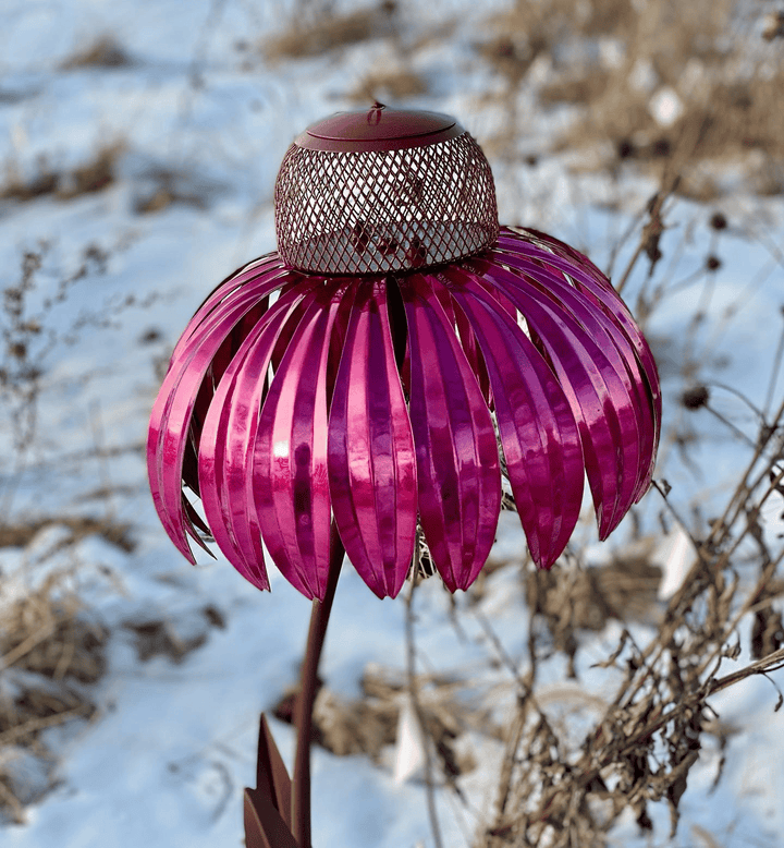 Charming metal flower bird feeder house, a decorative garden ornament for outdoor nature.