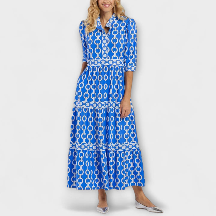 Sophisticated button-front midi dress for women, boasting a trendy chain print and elegant collar.