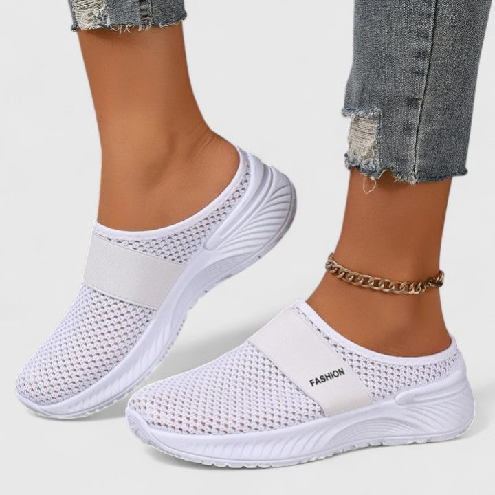 Chic ladies' sneakers with orthopaedic design, providing comfort & support.