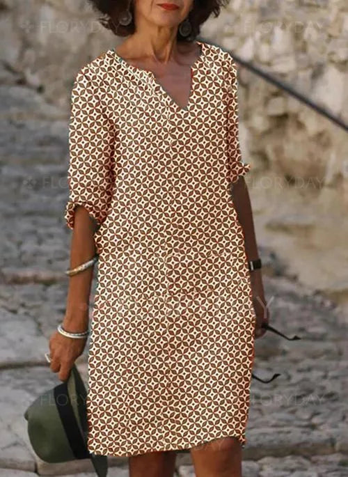 Effortless women's casual summer dress. Loose fit midi style, great for everyday comfort or holiday wear.