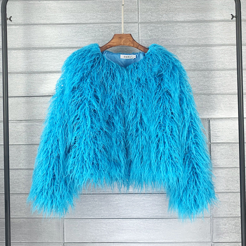 Plush & colorful women's fluffy short jacket. A vibrant and cozy statement piece for any season.