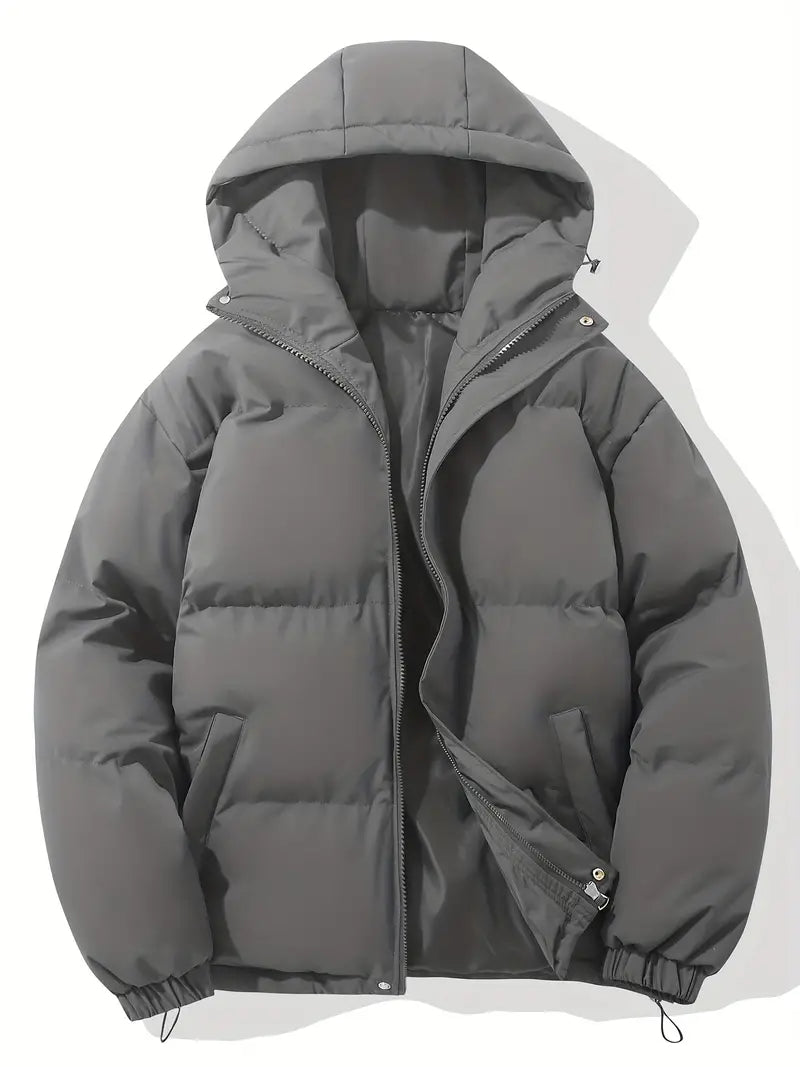 Essential women's hooded puffer jacket for winter, offering ultimate warmth, coziness, and fashion-forward style.