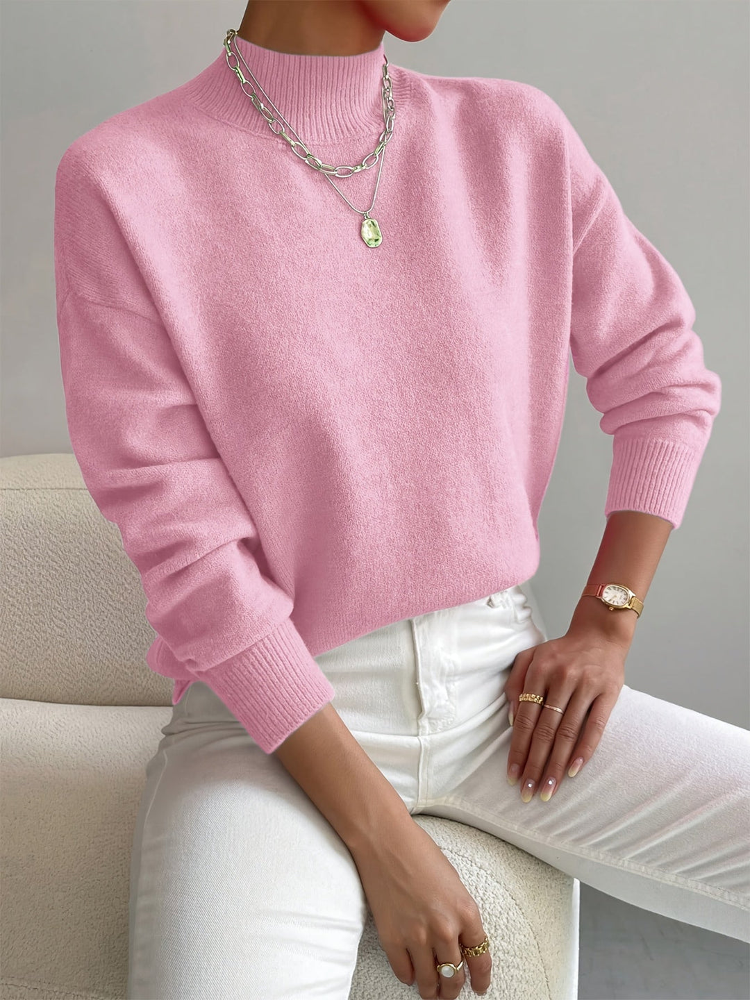Long sleeve high neck women's sweater, a cozy essential for cold weather.
