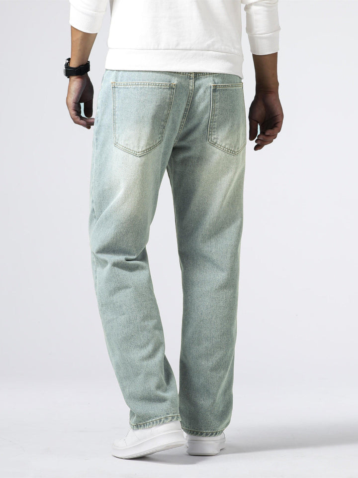 Stylish men's straight leg jeans, classic washed denim bottom for versatile everyday fashion.