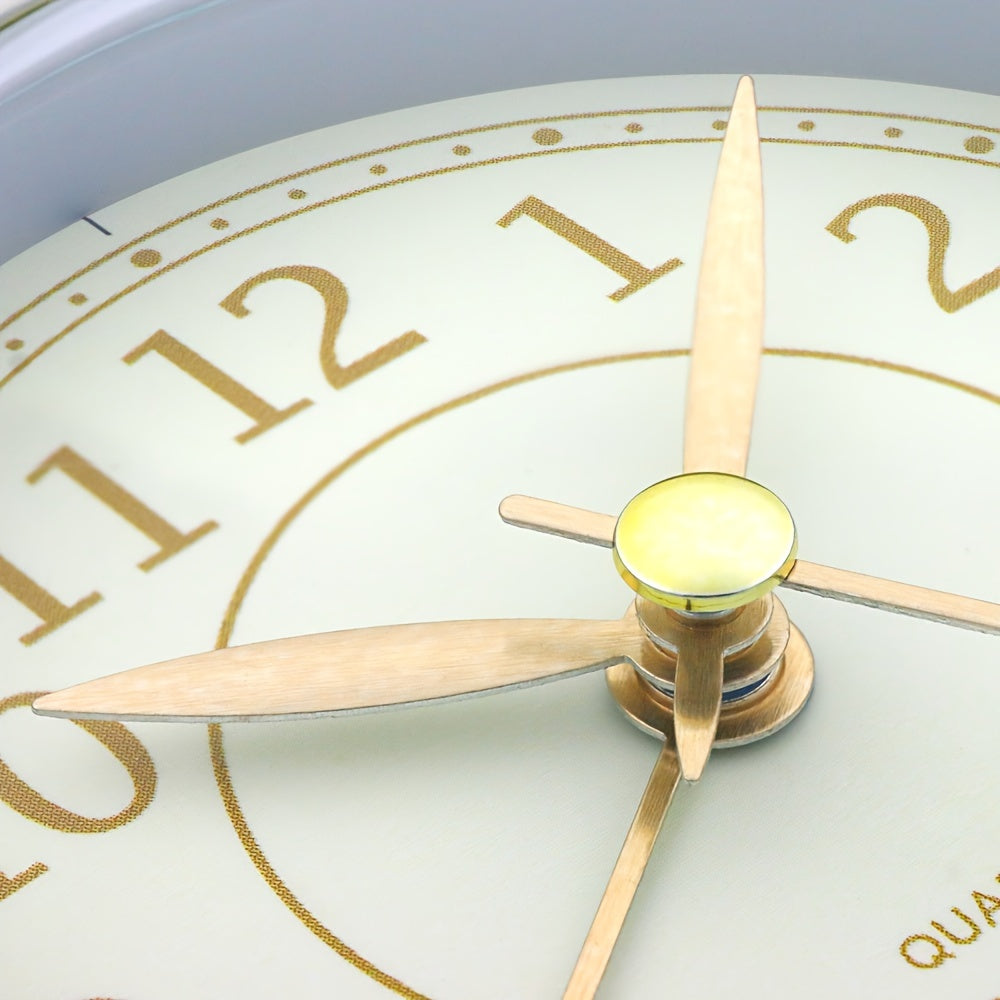 Light green vintage analogue clock with quiet movement, clearly readable dial, and built-in night light.