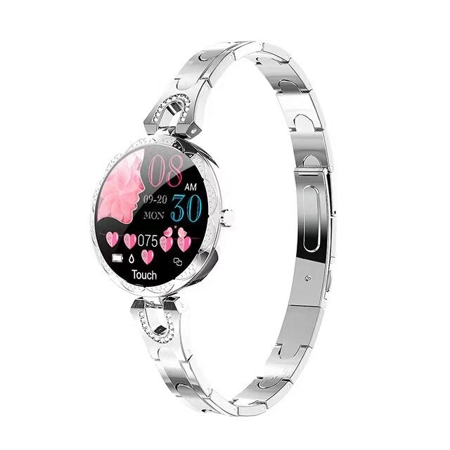 Close-up of a black unisex smartwatch display, showing fitness data and time, a smart tech accessory.