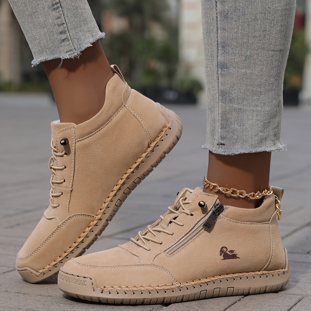 Comfortable women's high-top sneakers, with both zip and laces for easy on/off.