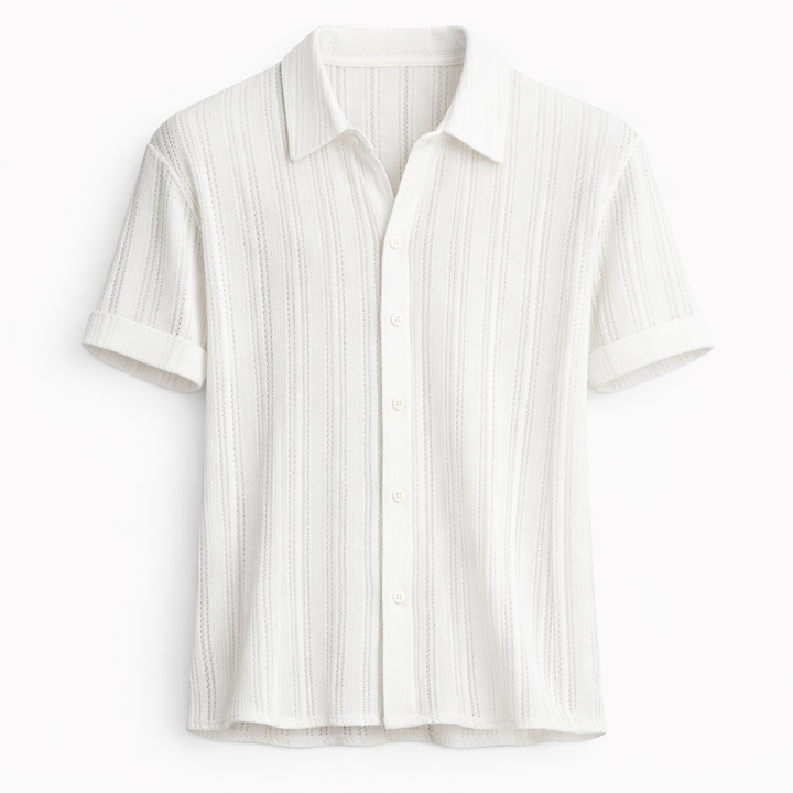 Close-up of men's textured short-sleeve polo with subtle vertical stripes, comfort fit.