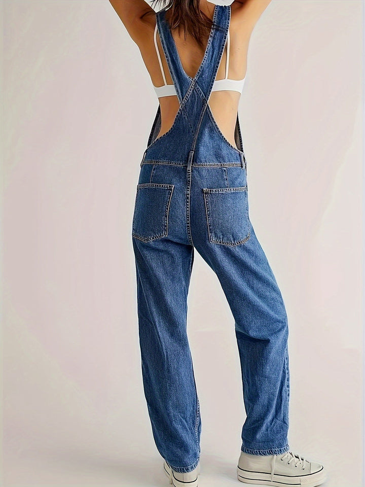Model wearing women's loose fit denim dungarees, comfortable casual overalls for relaxed style.