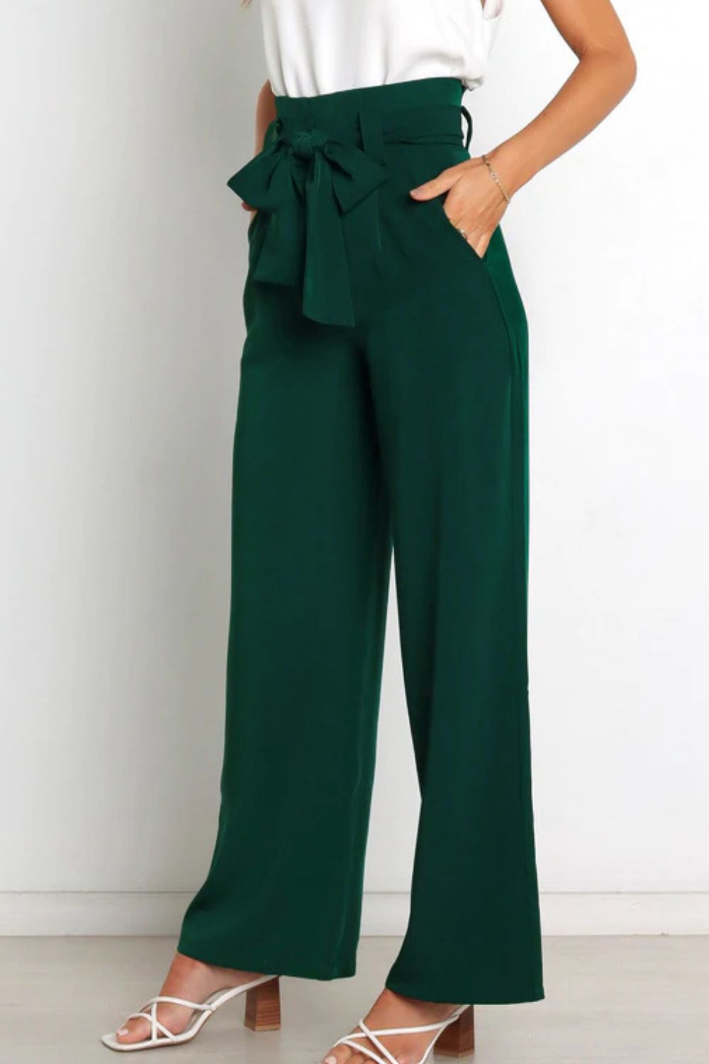 Comfortable and stylish women's high waist paperbag pants, with a pretty bow detail.