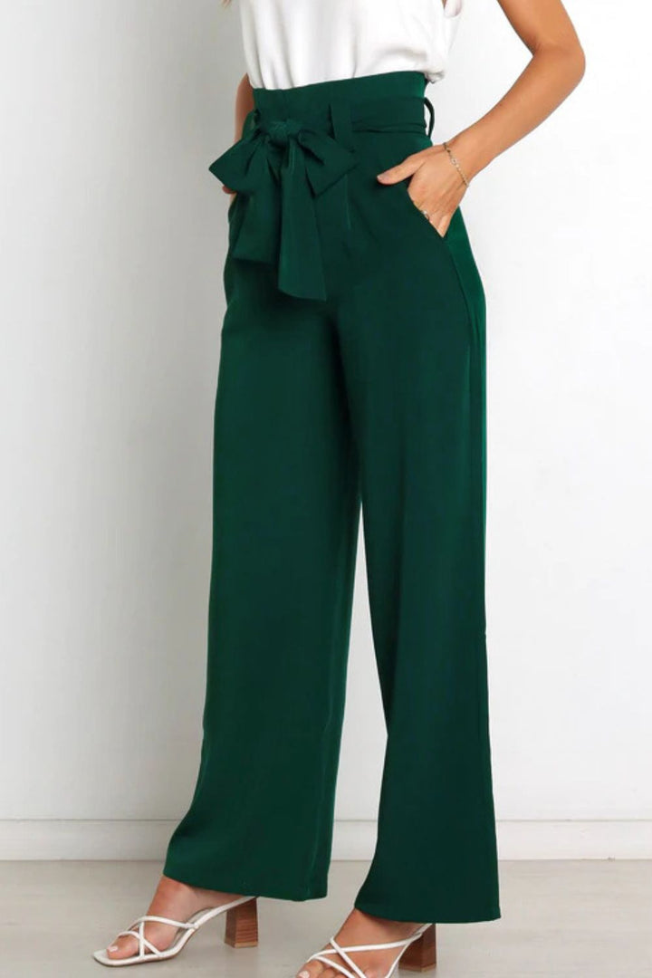 Comfortable and stylish women's high waist paperbag pants, with a pretty bow detail.