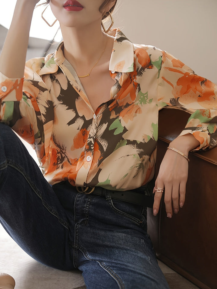 Comfortable women's floral print blouse with a versatile, relaxed fit for spring and autumn wear.