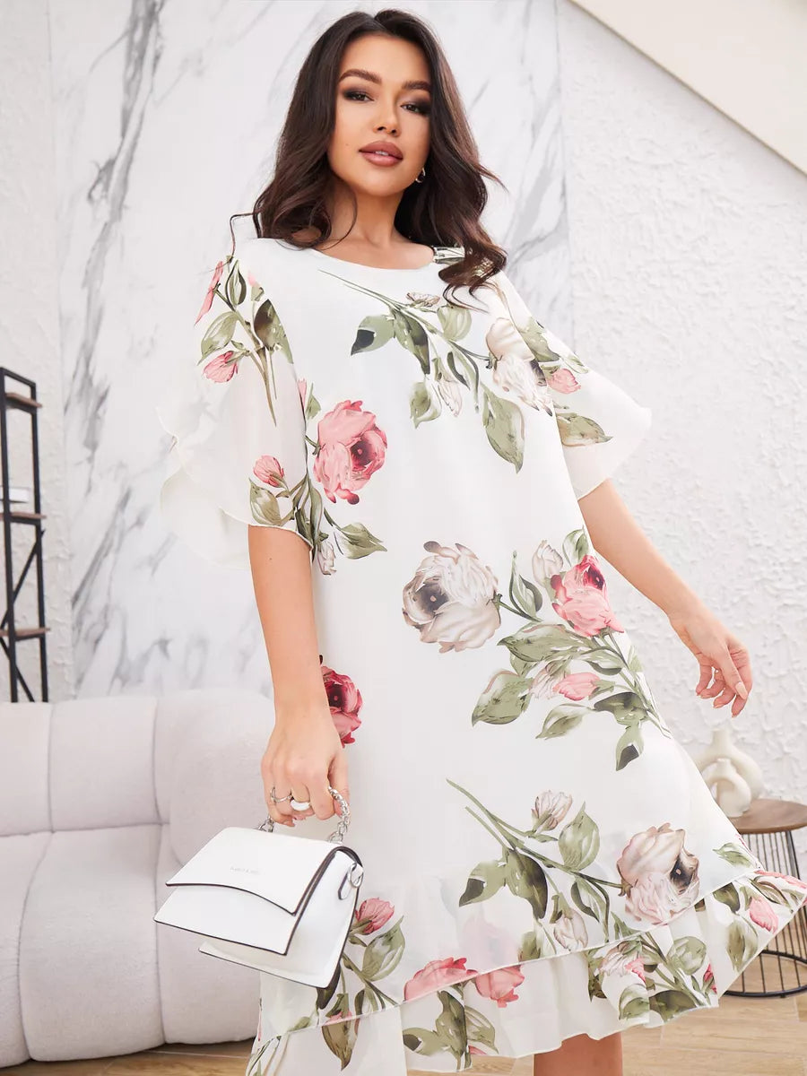 Stylish women's day dress: vibrant floral print, flowy short sleeves, and a delicate ruffle hem.