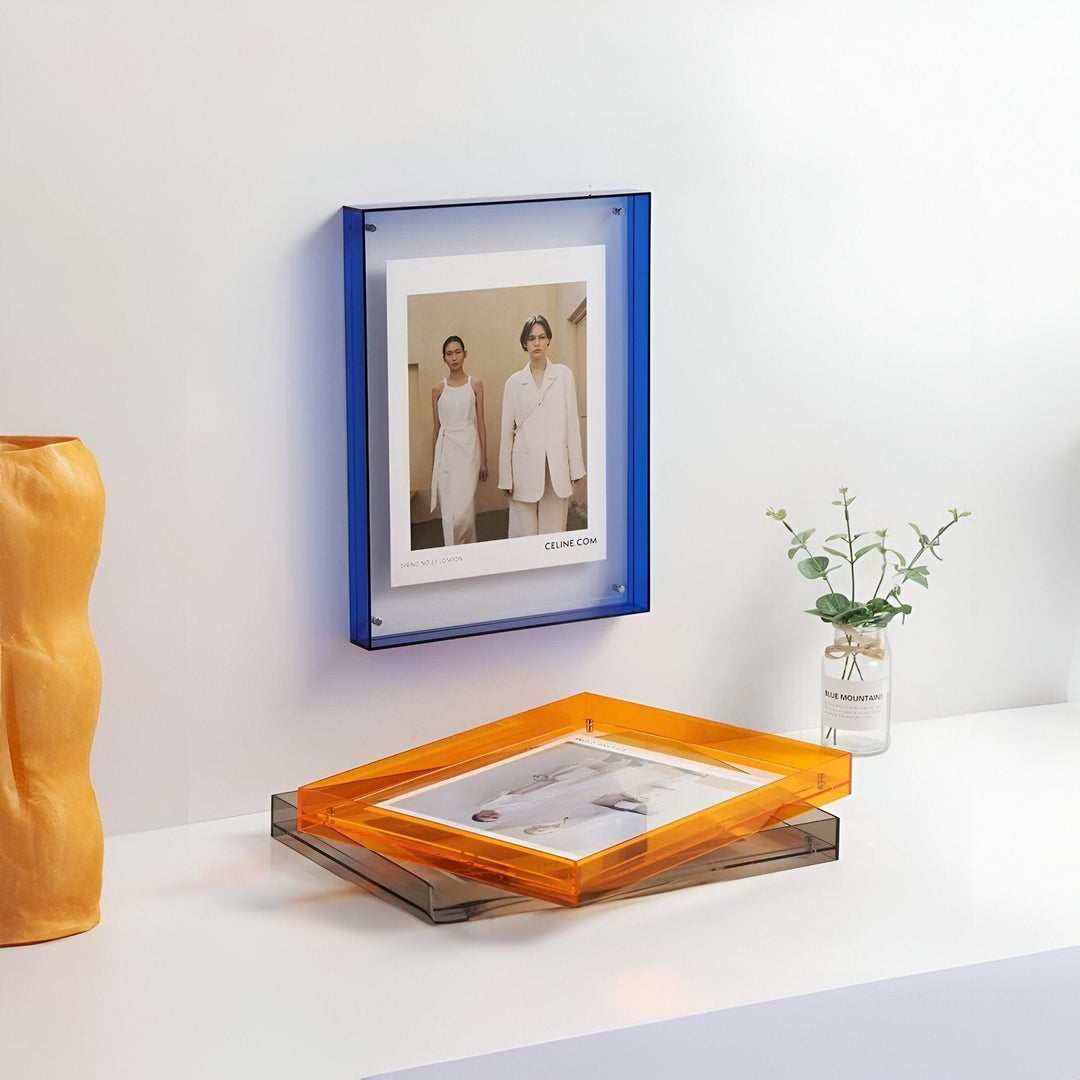 Clear acrylic wall photo frame, ideal for minimalist gallery art display in any contemporary space.