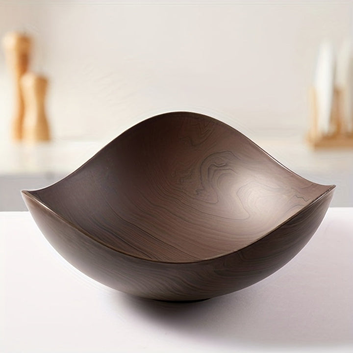 Large polypropylene fruit bowl, decorative wood look for tabletop storage and serving.