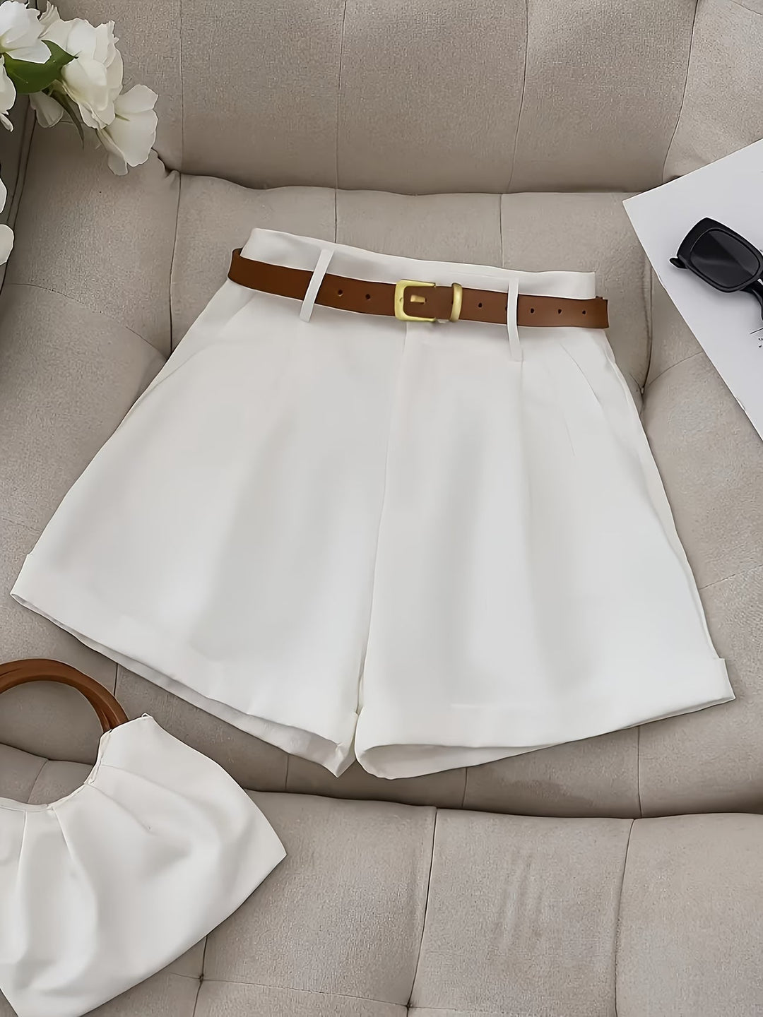 Women's classic belted shorts for effortless everyday style. Comfortable high-waist summer fashion.