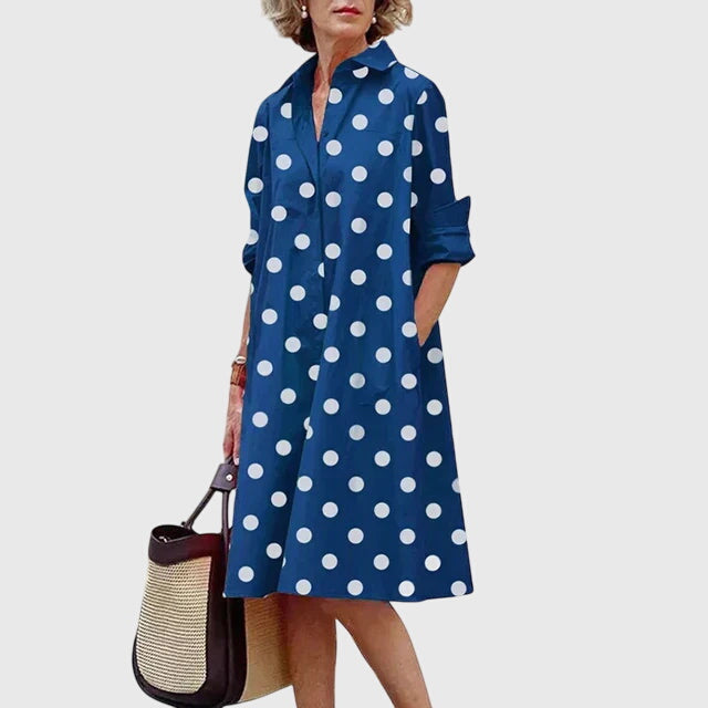 Front view of a comfortable long sleeve dress with pockets, highlighting its flattering silhouette.