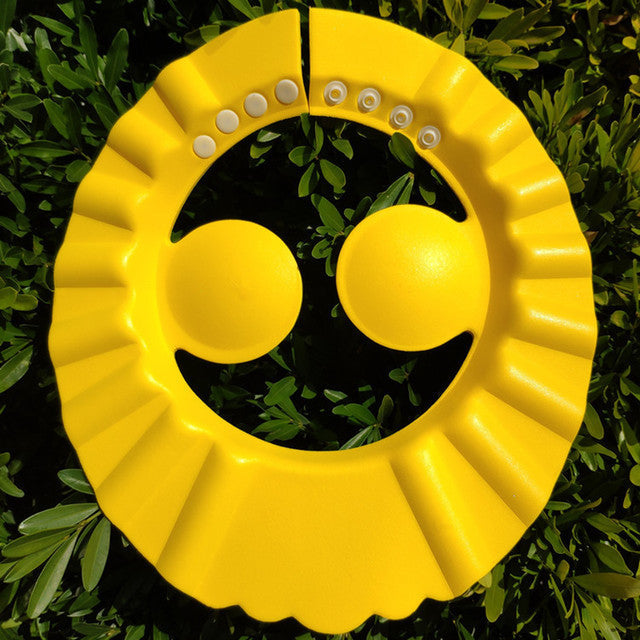 Prevent water in eyes & ears with this adjustable baby shampoo cap, ensuring tear-free & happy bath time.
