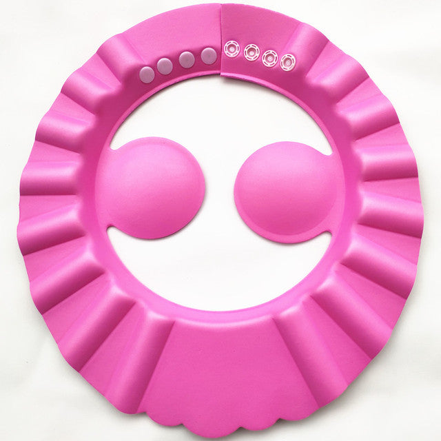 Adjustable baby bath cap, an essential accessory protecting infant eyes & ears during tear-free shampooing.