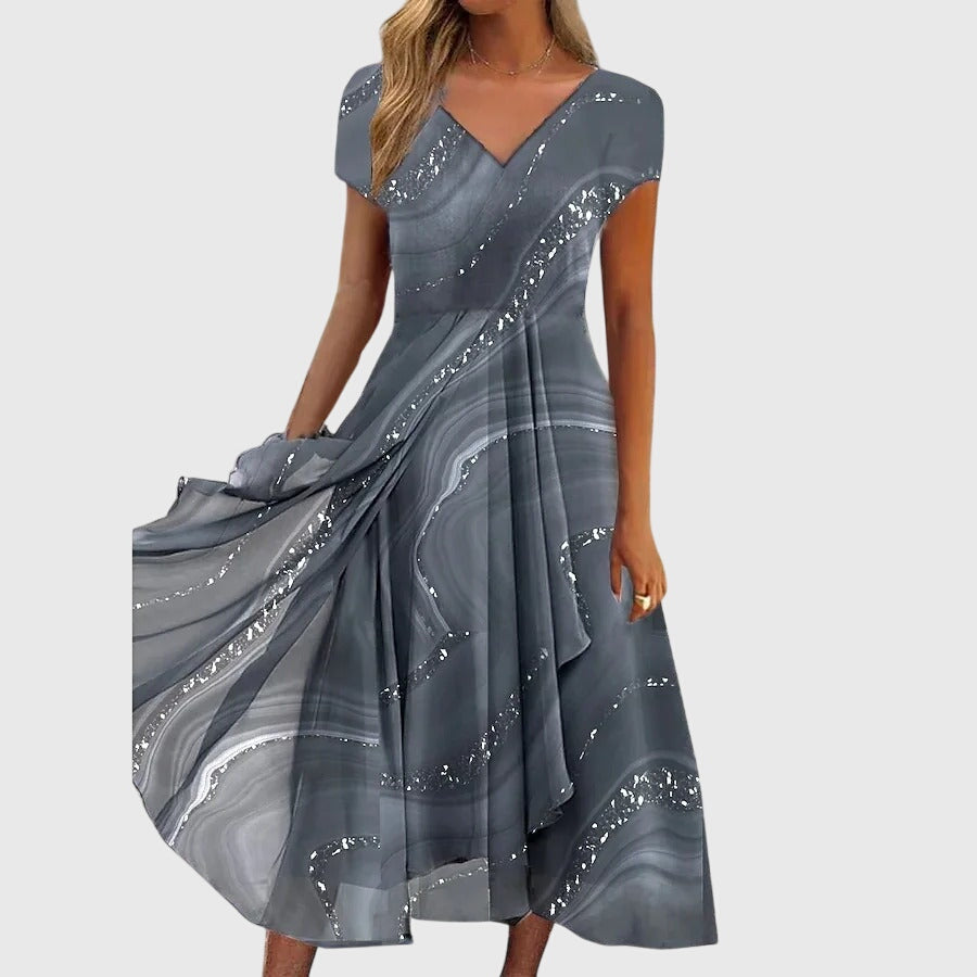 Comfortable women's V-neck midi dress; flowing design ideal for elegant casual outfits or summer fashion.