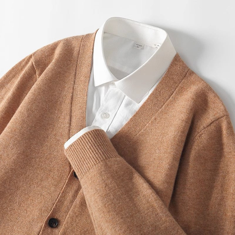Comfortable men's v-neck cardigan sweater. Classic button-down for casual layering and warmth.