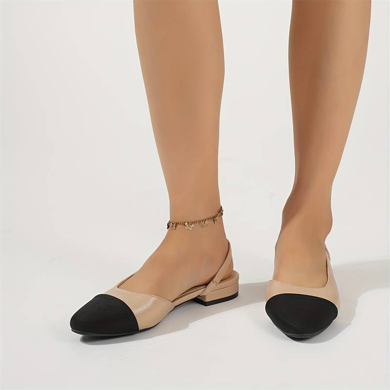 Chic women's ballerinas in beige & black, classic slingback design for versatile style.