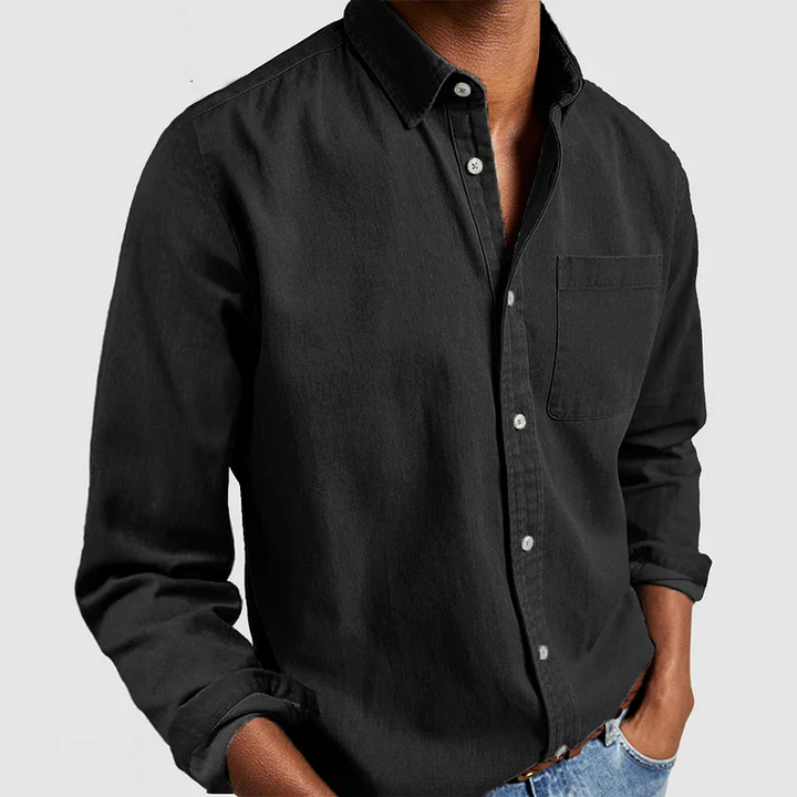 Stylish men's long-sleeve casual button-down shirt in a classic solid color, perfect for everyday wear.