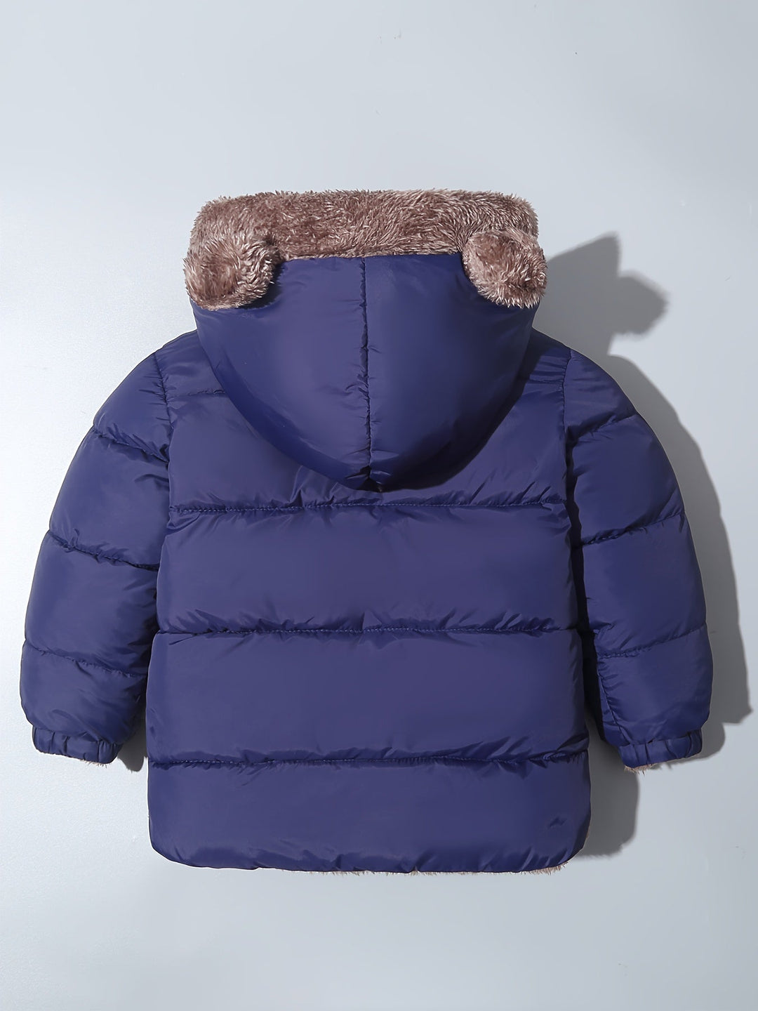 Warm & fun kids' Bear Hug winter coat with cute bear ears, essential outdoor gear for playful cold-weather activities.