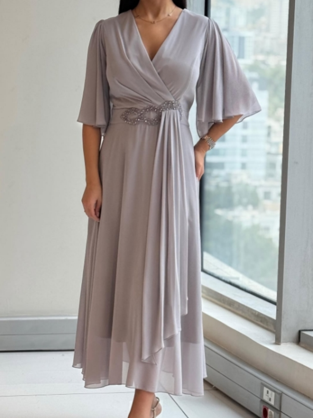 Elegant long V-neck dress for women, perfect for formal occasions, parties, or as a wedding guest.
