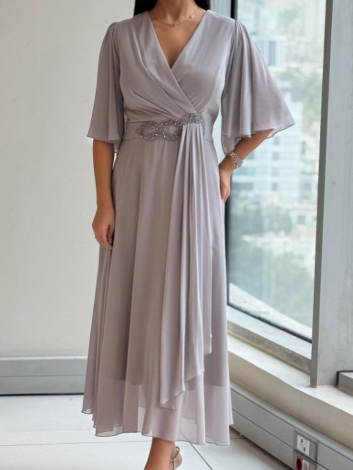Elegant long V-neck dress for women, perfect for formal occasions, parties, or as a wedding guest.