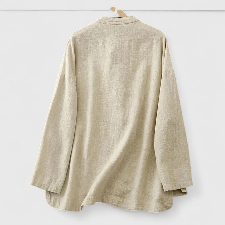 Women's relaxed fit shirt with unique front knot detail. Perfect casual everyday wear for summer & spring fashion.