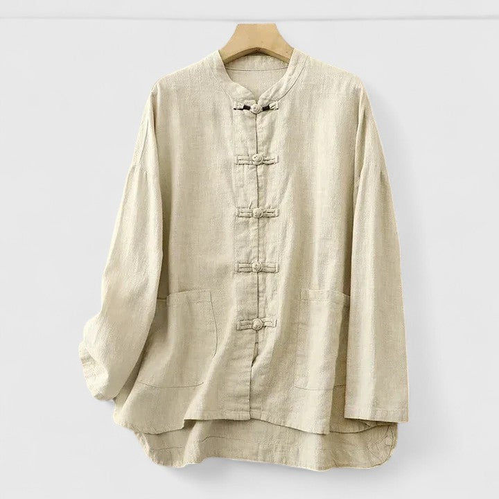 Casual women's relaxed fit shirt showcasing a unique front knot detail & practical patch pockets. Great for everyday wear.