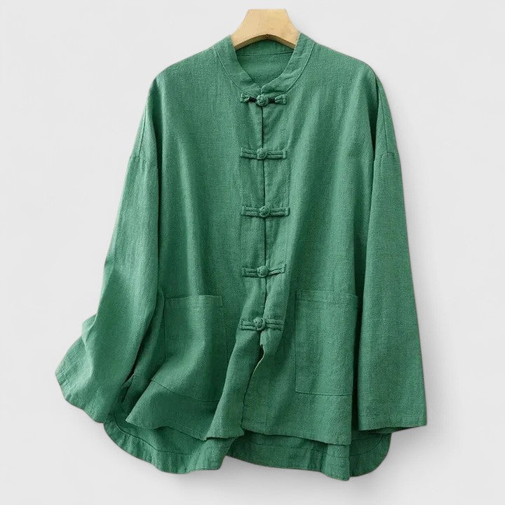 Versatile women's relaxed fit shirt with an elegant knot detail. A stylish and comfortable top for spring/summer fashion.