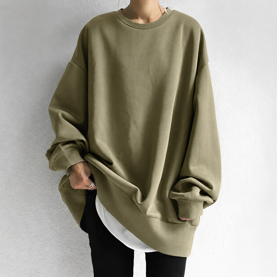 Stylish women's drop shoulder tunic sweater. Comfortable long sleeve crewneck for everyday wear.